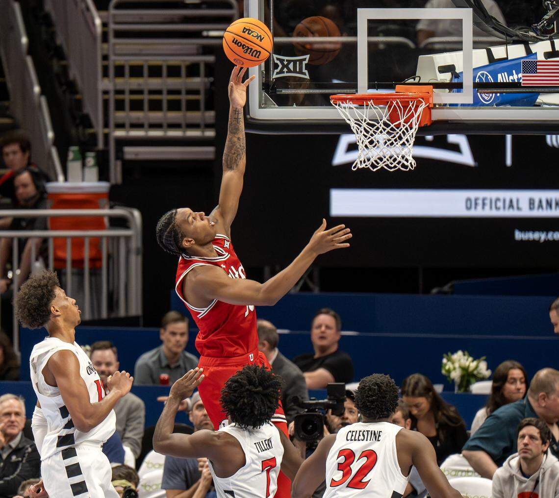 Utah Utes forward Kendyl Sanders (13) makes a lay up against the Cincinnati Bearcats during the first half of the Big 12 Men's Basketball Tournament at T-Mobile Center on Tuesday, March 10, 2026, in Kansas City.