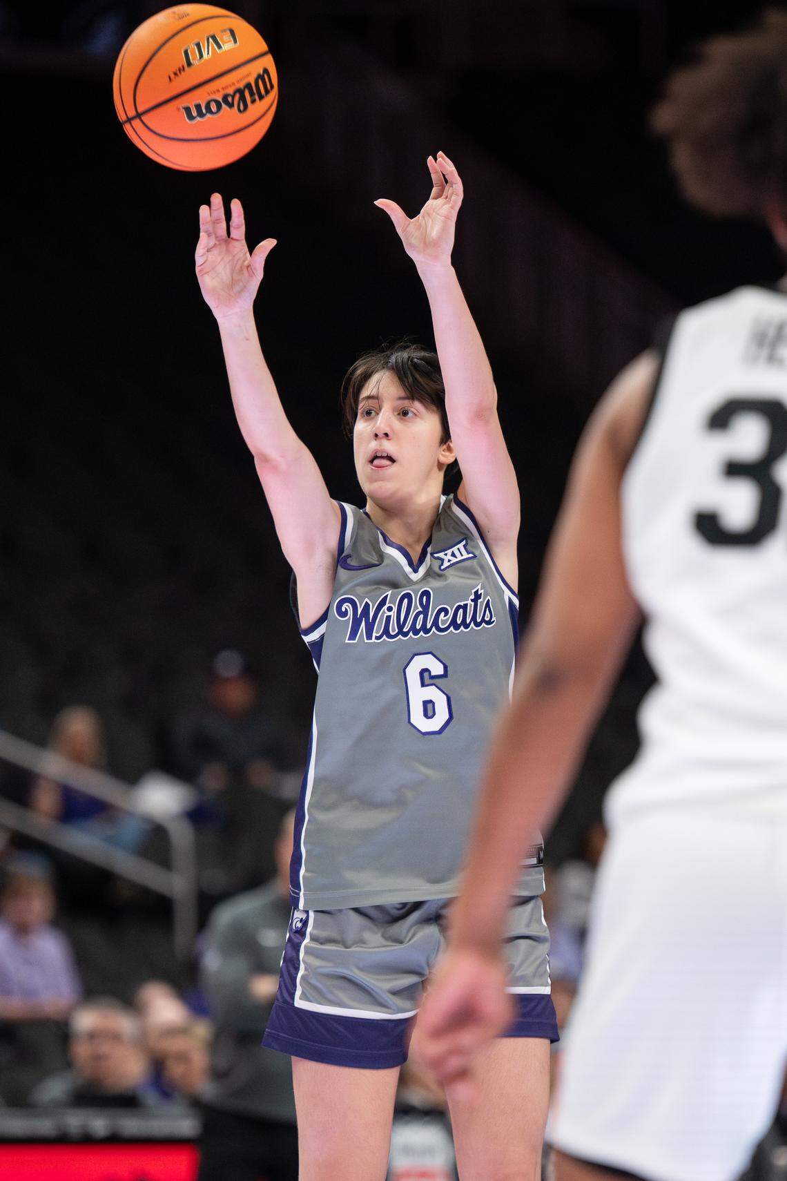 Kansas State Wildcats guard Gina Garcia (6) hits a three-pointer against Oklahoma State during the third round of the Big 12 Women’s Basketball Tournament.