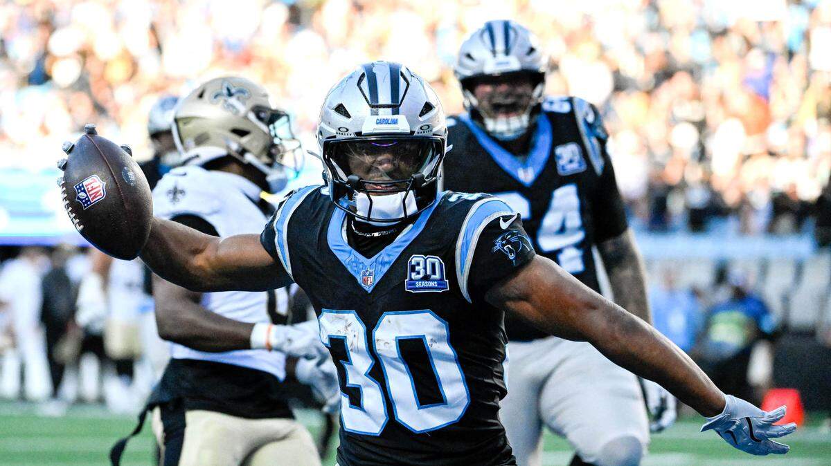 Carolina Panthers running back Chuba Hubbard (30) reacts after scoring a touchdown in the fourth qarter at Bank of America Stadium.