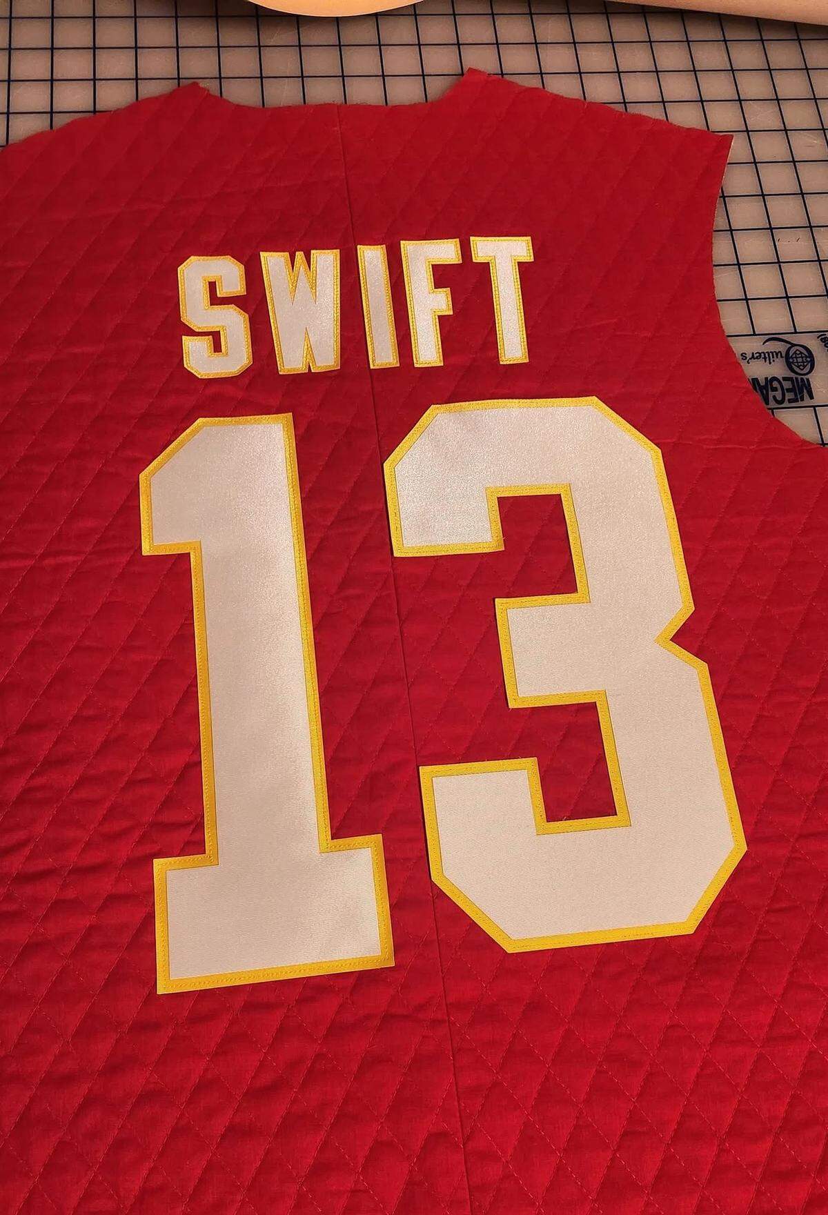 Shuster is ready to get a coat to Taylor Swift, with her lucky number on the back.