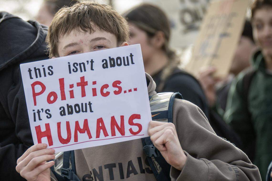 Students at Shawnee Mission North High School marched in protest of ICE and the Trump administration along Johnson Drive on Wednesday, February 11, 2026, in Overland Park.