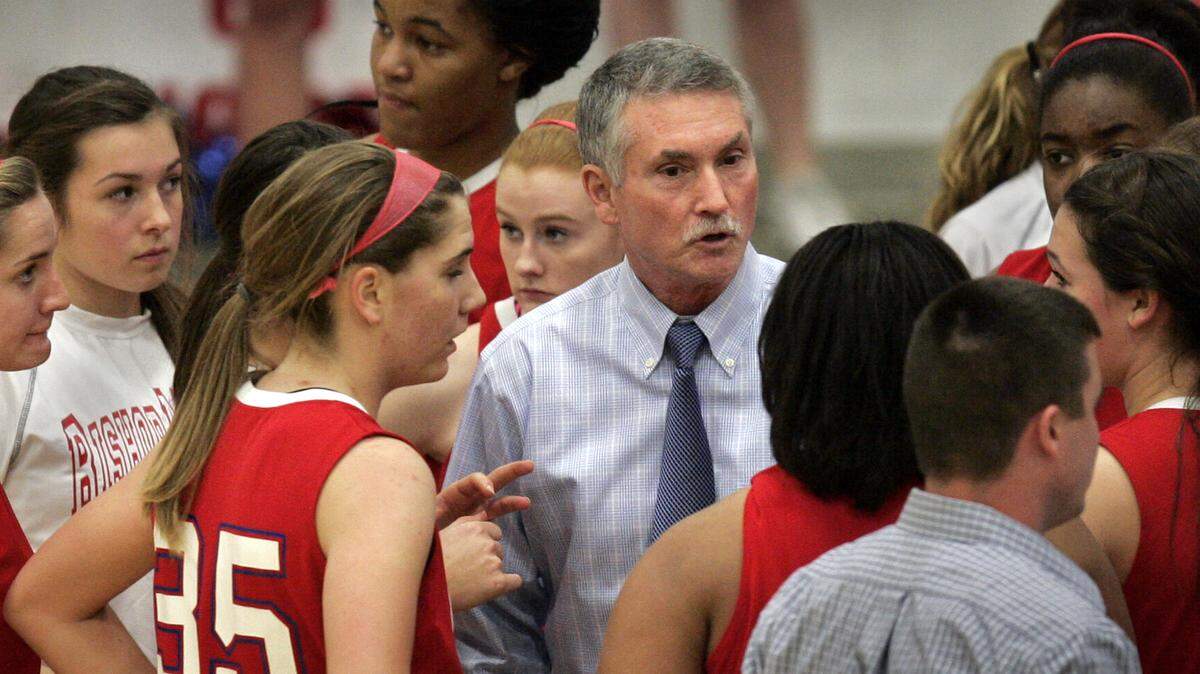 Bishop Miege coach Terry English talked to his team during a timeout in 2011 at the Hy-Vee Shootout.