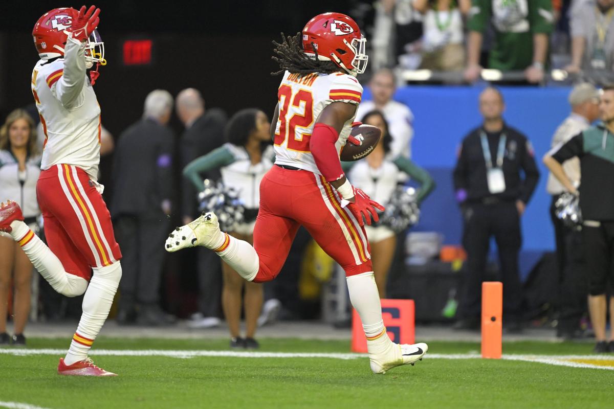 Chiefs linebacker Nick Bolton carries a fumble recovery for a touchdown during the first half of Super Bowl LVII between the Kansas City Chiefs and the Philadelphia Eagles on Sunday, Feb. 12, 2023, at State Farm Stadium in Glendale, Arizona.