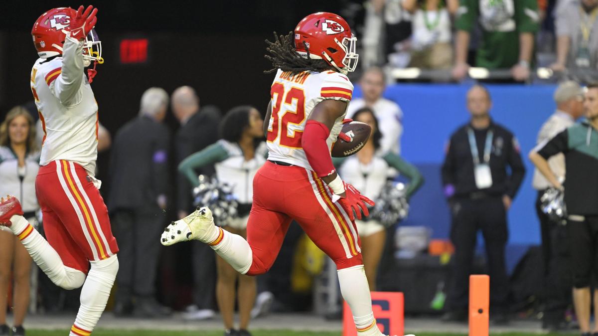 Chiefs linebacker Nick Bolton carries a fumble recovery for a touchdown during the first half of Super Bowl LVII between the Kansas City Chiefs and the Philadelphia Eagles on Sunday, Feb. 12, 2023, at State Farm Stadium in Glendale, Arizona.