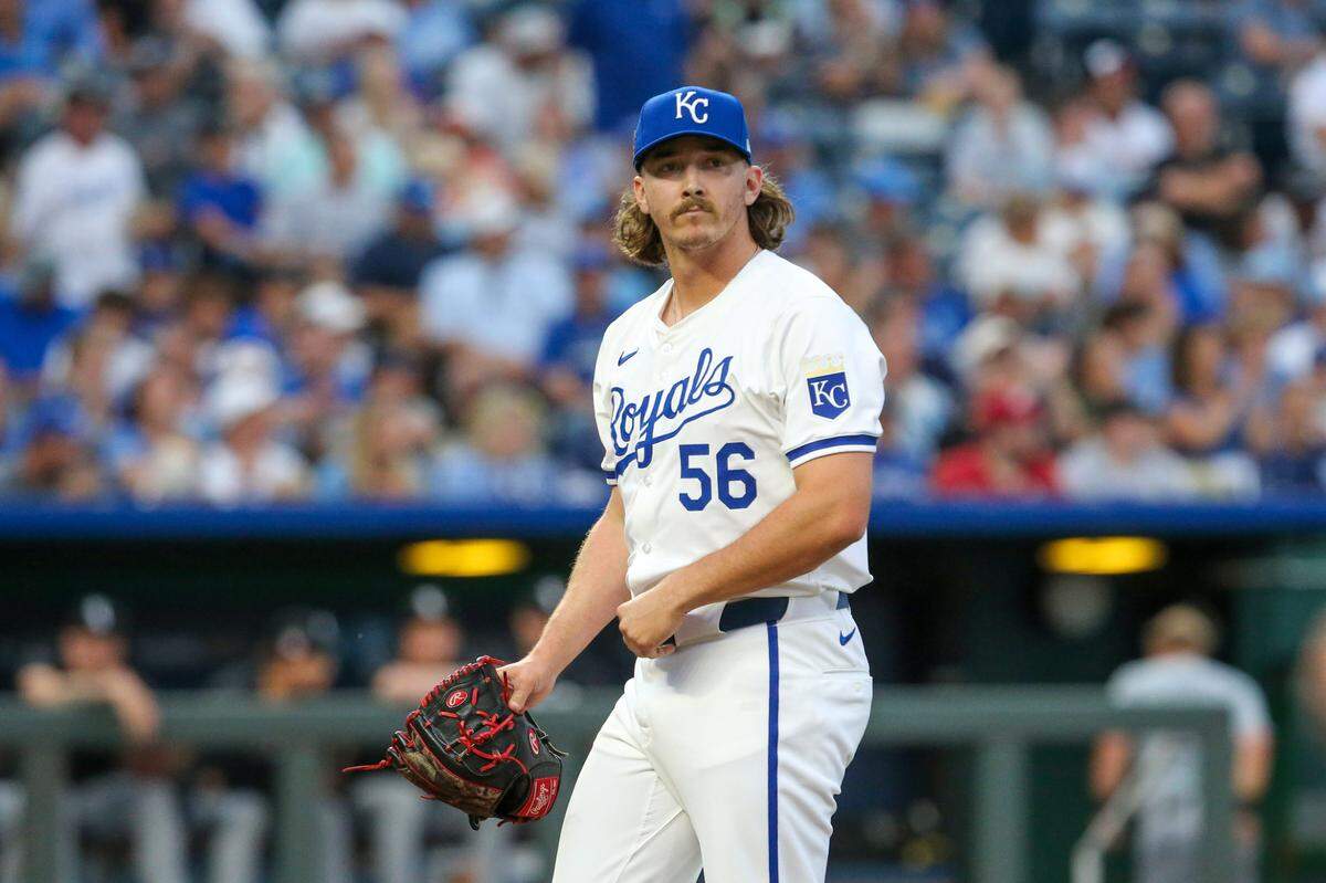 Kansas City Royals relief pitcher Hunter Harvey (56) looks at the scoreboard as he comes off the field after the top of the eighth inning against the Chicago White Sox at Kauffman Stadium on July 20, 2024.