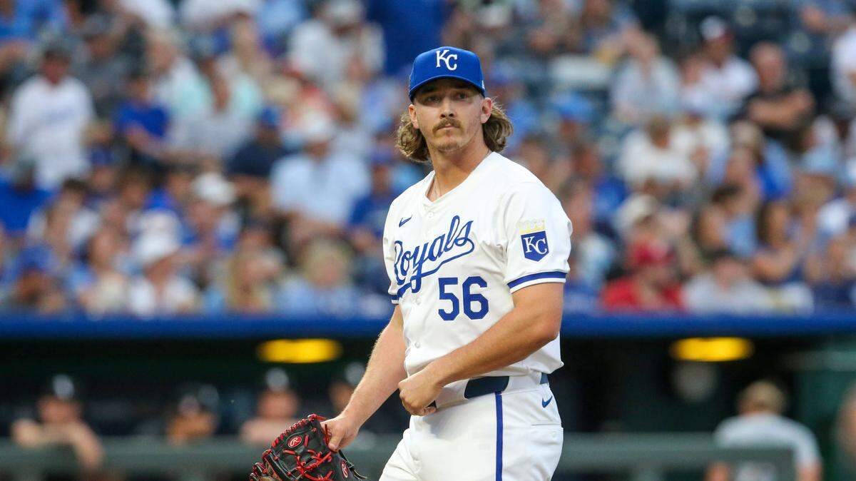 Kansas City Royals relief pitcher Hunter Harvey (56) looks at the scoreboard as he comes off the field after the top of the eighth inning against the Chicago White Sox at Kauffman Stadium on July 20, 2024.