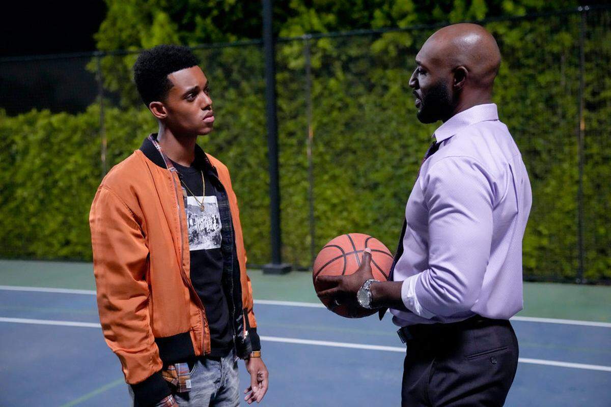 Will (Jabari Banks, left) has to learn a new way of life from his uncle, Phillip Banks (Adrian Holmes).