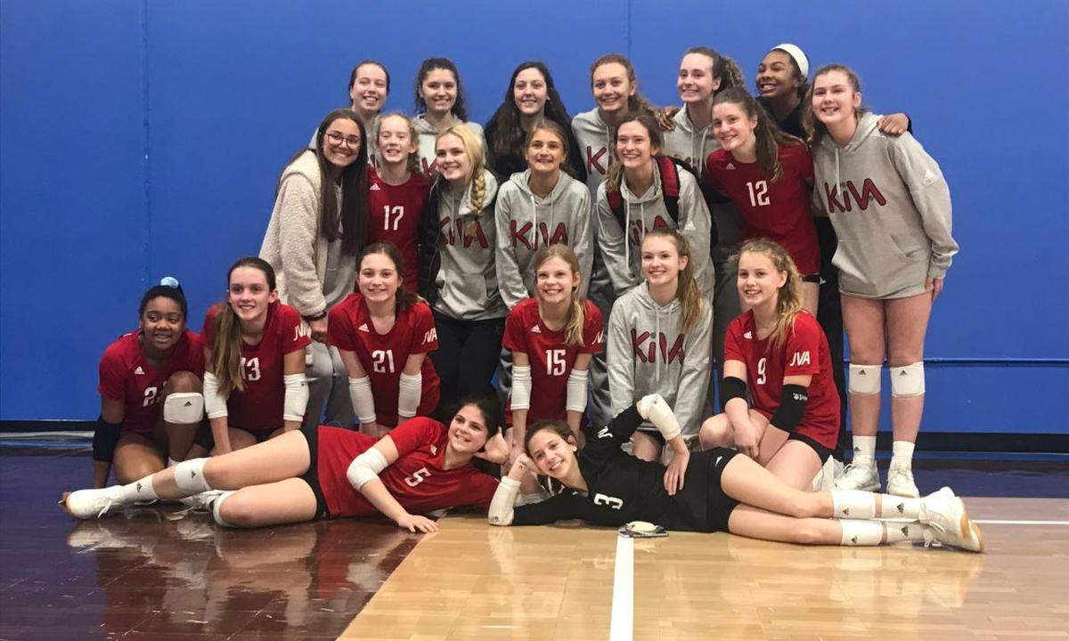 Teammates of Rhyan Prather and Kacey McCaw from the KIVA volleyball organization are pictured during a tournament in Kansas City. The two players and their mothers were killed in a traffic crash while on their way to the event.