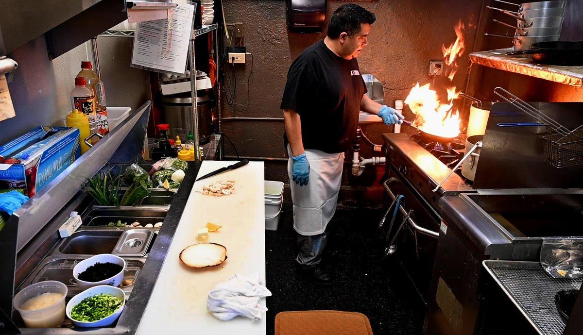 At Brookside Sushi, chef Salvador Ortiz prepares The Dynamite, consisting of lemon butter scallops, mushrooms and spicy mayo that are a melt-in-your-mouth combination with just the right kick.