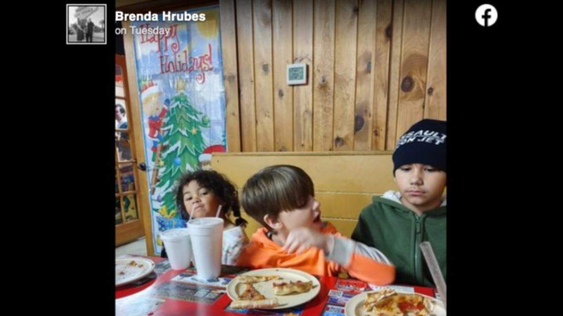Brothers Declan (center) and Aiden (right) helped rescue their sister from a dog attack, family members say.