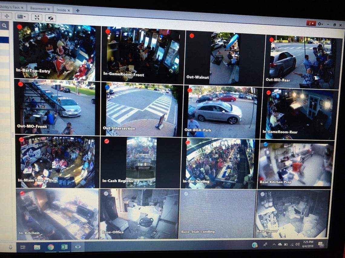 Letty Stegall's laptop screen in Veracruz, Mexico, allows her to view activity inside and outside The Blue Line hockey bar in the River Market.