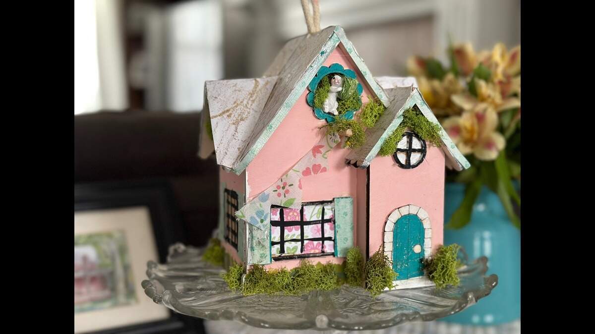 Far from fine art, but thankfully she’s better at building friendships than at building craft houses.