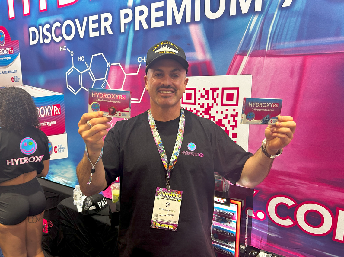 Ryan Lewis, owner of 7-OH brand HydroxyRx, poses with his product at July’s CHAMPS Trade Show in Las Vegas.