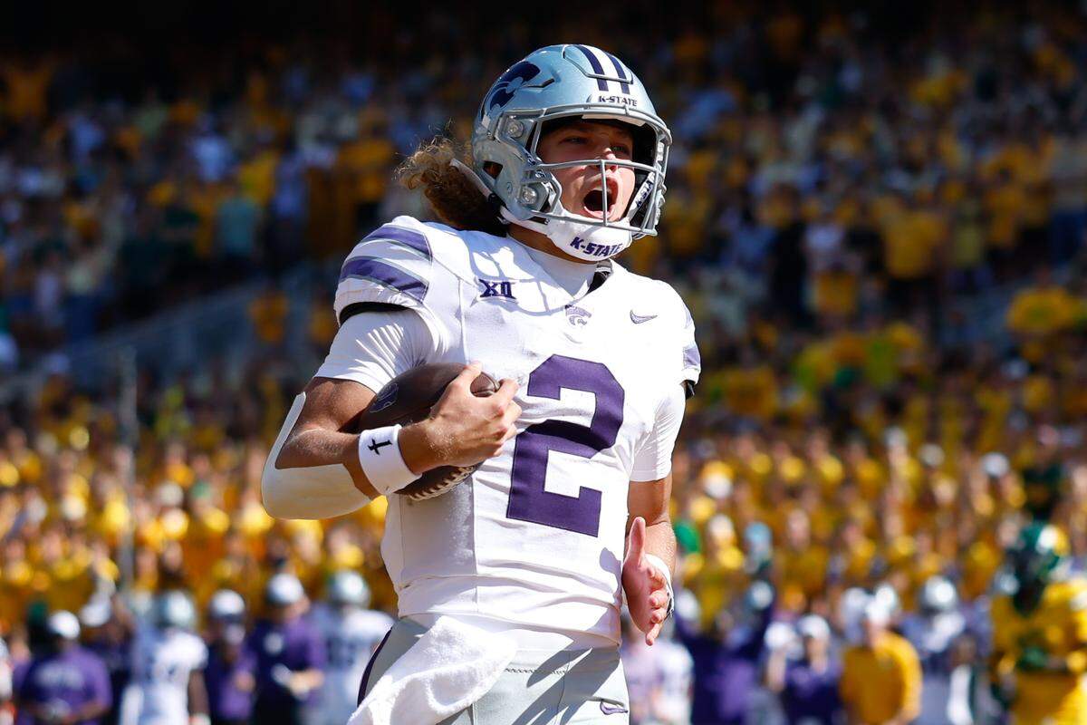 Kansas State Wildcats quarterback Avery Johnson (2) reacts after running for a 31-yard touchdown against the Baylor Bears during the first half at McLane Stadium on Oct. 4, 2025.