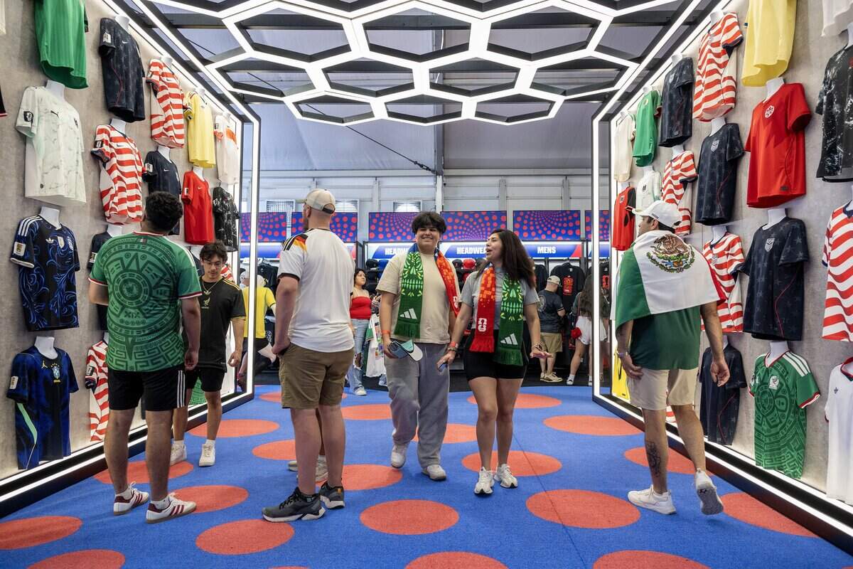 Visitors shop at the FIFA Store during the FIFA Fan Festival on Thursday, June 11, 2026, in Kansas City.