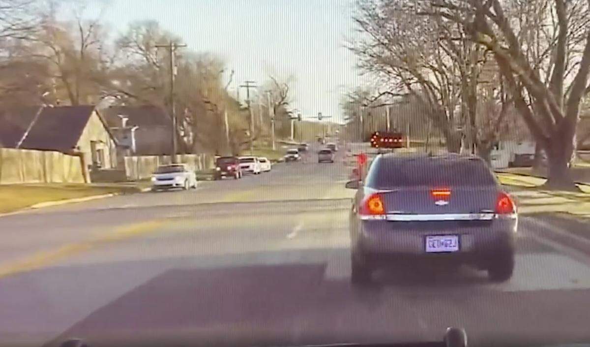 Police dashcam video shows the moment in March 2021 when two Kansas City police officers pulled over Herb Robinson, then a detective, as he drove an unmarked police vehicle in full uniform. Robinson told The Star he believes he was racially profiled during the traffic stop.