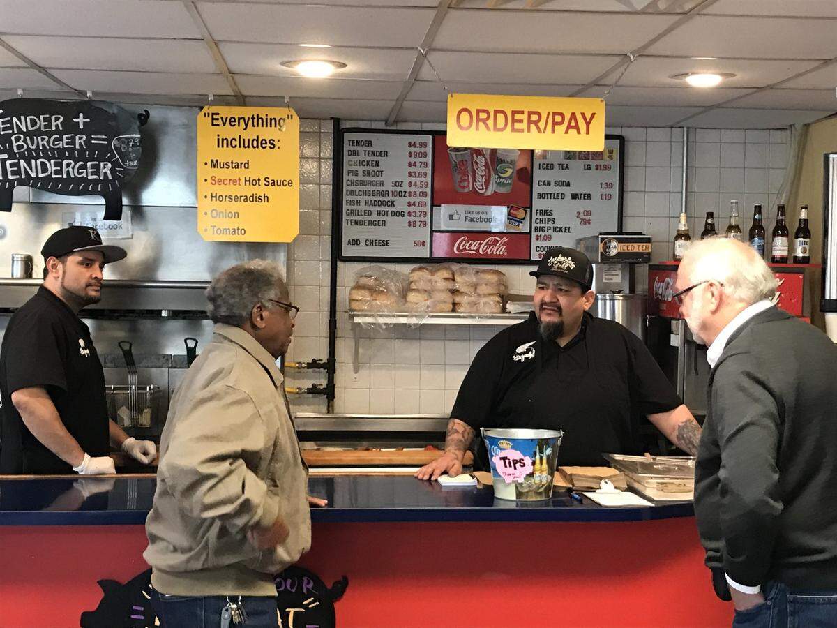 Back in 2017, Bill Chaney, left, and Ardie Davis talked with managers Christopher Garcia and Javier Arroyo at the Tenderloin Grill, 900 Southwest Blvd. Arroyo died in January.