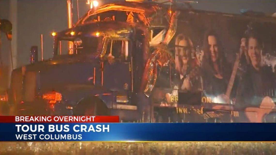 A Branson, Missouri, band’s tour bus overturned Friday with 23 people on board, injuring four, police said. Screengrab from WCMH.