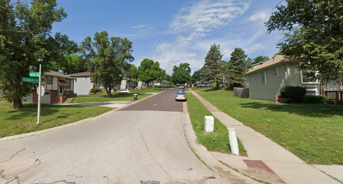 A woman, later identified as 68-year-old Janet Dam, died after she was struck by a vehicle while walking early Tuesday near the bend where Goddard Street intersects with Switzer Road, just north of West 95th Street in Overland Park, according to a police spokesman. This Google Maps Street View image of the area is from 2021.