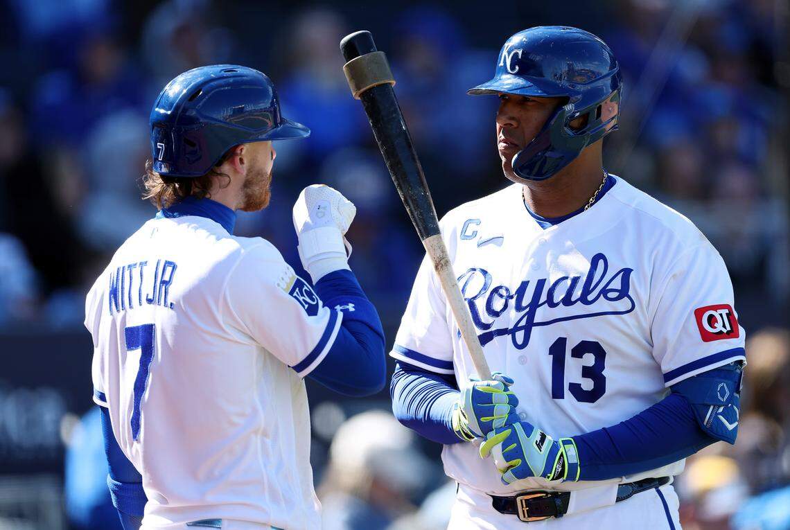 Royals shortstop Bobby Witt Jr. chats briefly with catcher Salvador Perez during a game against the Milwaukee Brewers at Kauffman Stadium in Kansas City on Saturday, April 4, 2026.