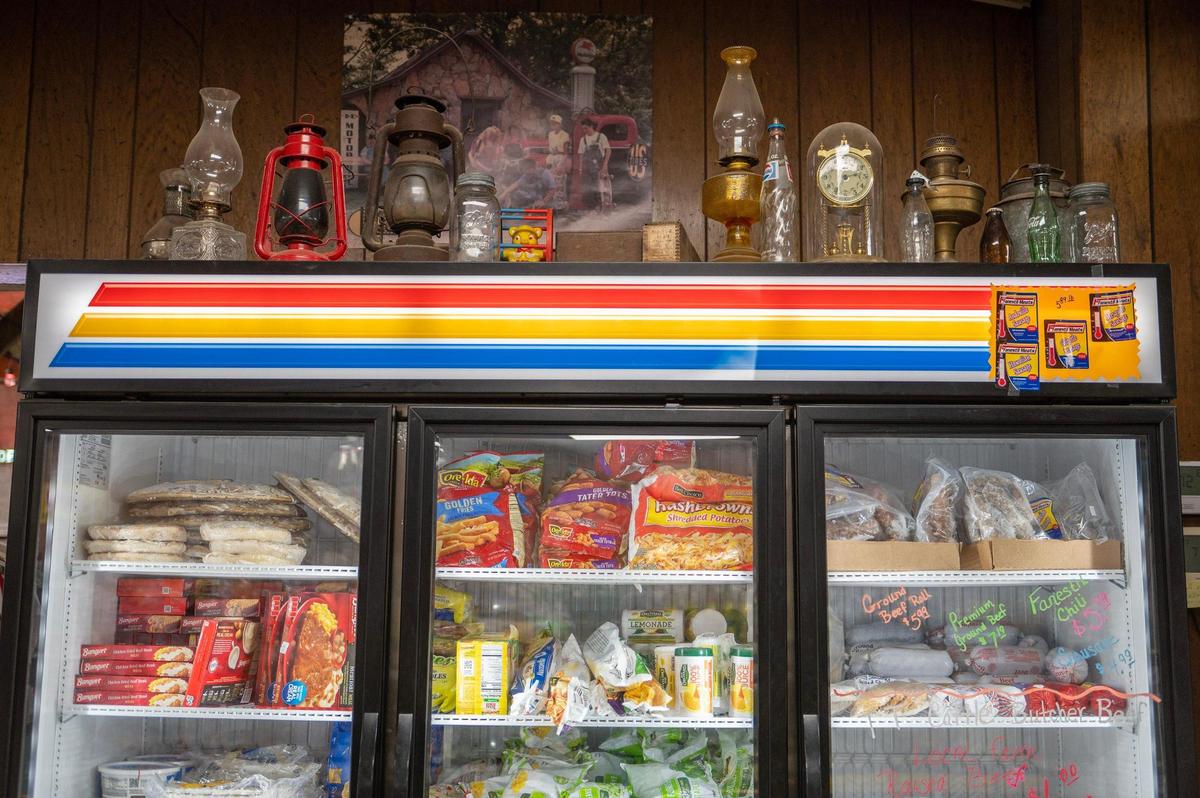 Antique trinkets are displayed alongside everyday provisions at The Mildred Store.