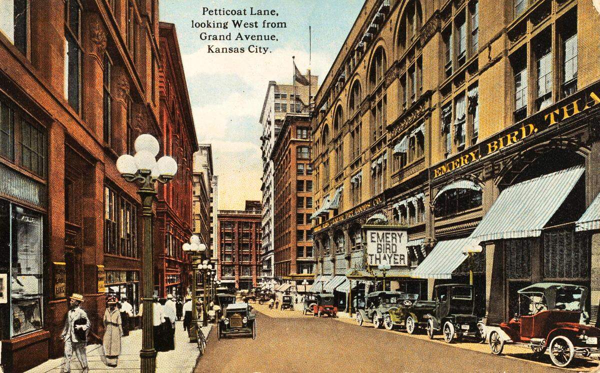 Petticoat Lane, at 11th Street between Main and Walnut streets, was a popular department store and dry goods district in downtown Kansas City that supplied many locally made clothing pieces from the Garment District.