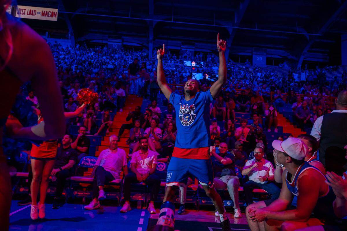 Kansas Jayhawks guard Darryn Peterson points to the sky during introductions at Late Night in the Phog, on Friday, October 17, 2025, in Lawrence.