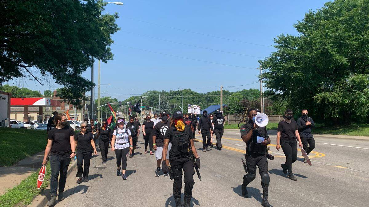 The Kansas City chapter of the Revolutionary Black Panther Party led an armed march along East 75 Street from Troost Avenue to Prospect Avenue on Saturday, July 3.