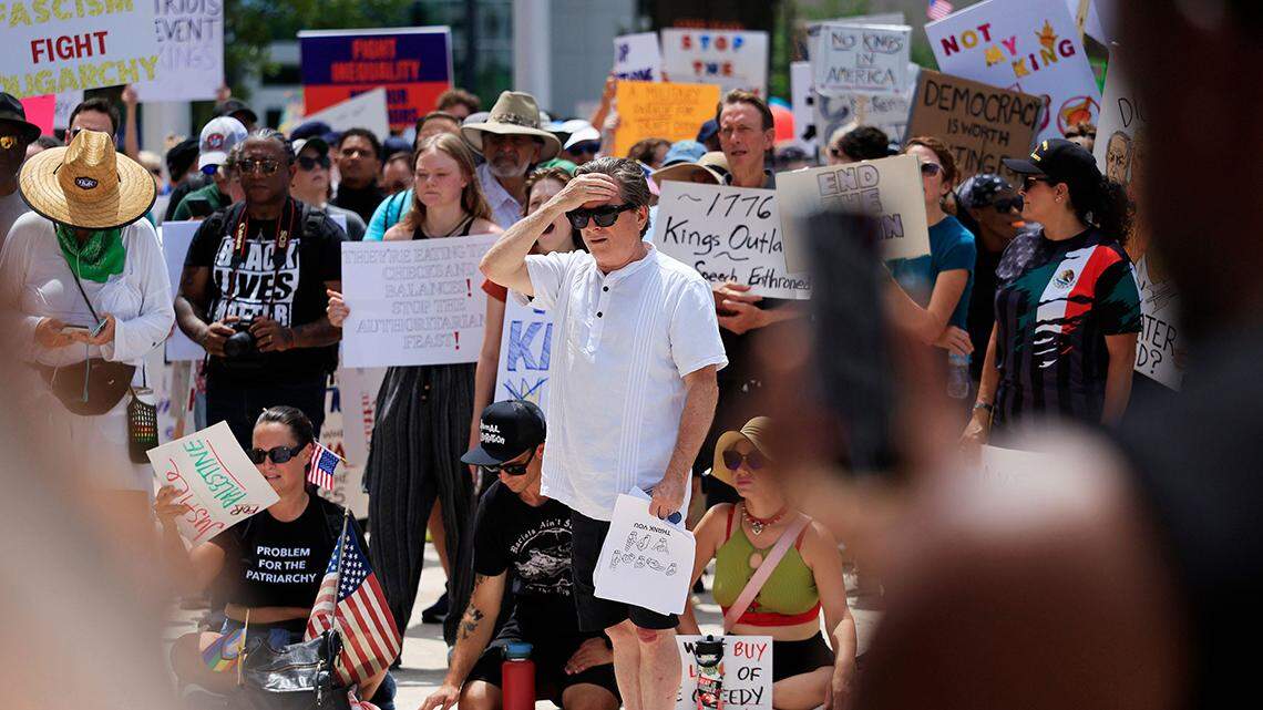 A man reacts after learning Minnesota Rep. Melissa Hortman and husband, Mark, were killed in Minnesota.