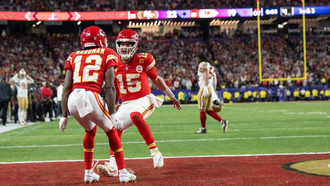 Kansas City Chiefs quarterback Patrick Mahomes (No. 15) celebrates with receiver Mecole Hardman after the team’s thrilling overtime victory over the San Francisco 49ers in Super Bowl LVIII.