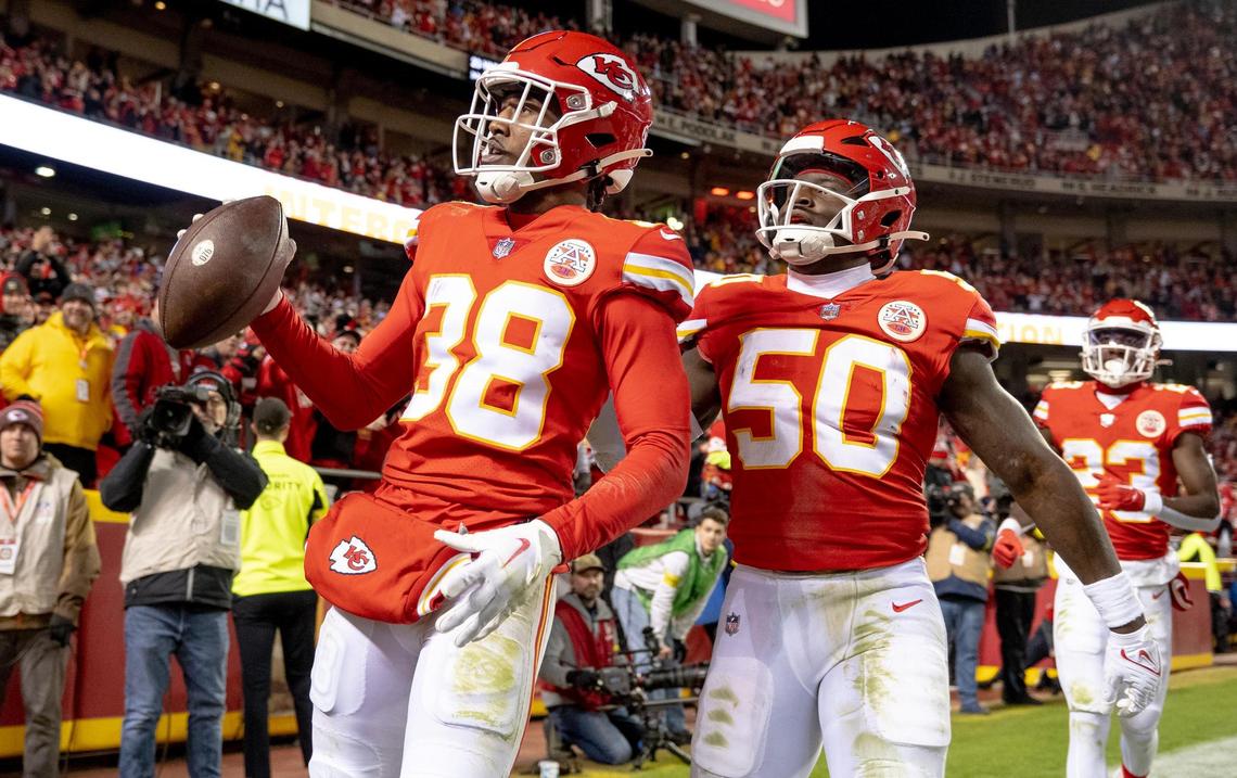 Kansas City Chiefs cornerback L’Jarius Sneed (38) celebrates an interception with linebacker Willie Gay (50) during an NFL football game against the Los Angeles Rams at Arrowhead Stadium on Sunday, Nov. 27, 2022 in Kansas City.