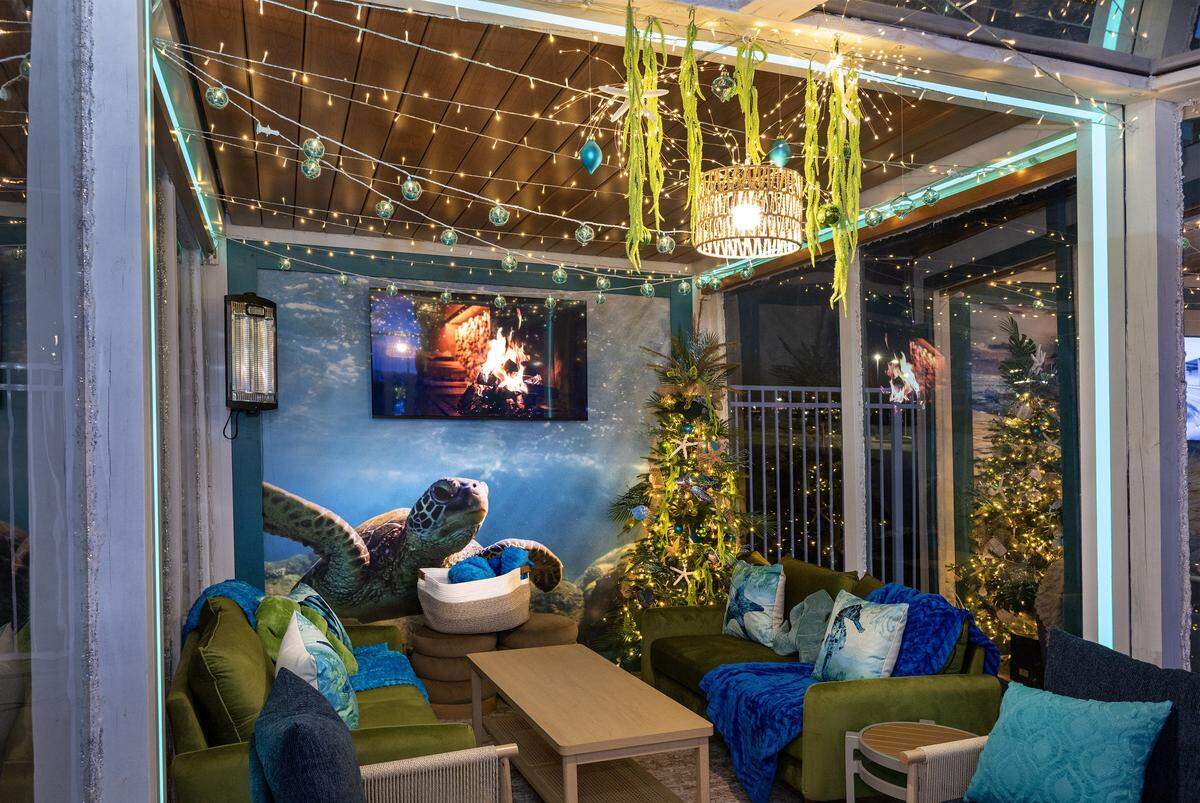 The Yule Tide & Turtle Time cabana is seen on Monday, November 17, 2025, in Kansas City, Kansas. Margaritaville Hotel Kansas City debuts the Frosted Cabanas, a unique holiday pop-up experience opening Wednesday, November 19, 2025. Guests can reserve private, heated cabanas on the pool deck, each featuring festive décor and a relaxed, tropical atmosphere.