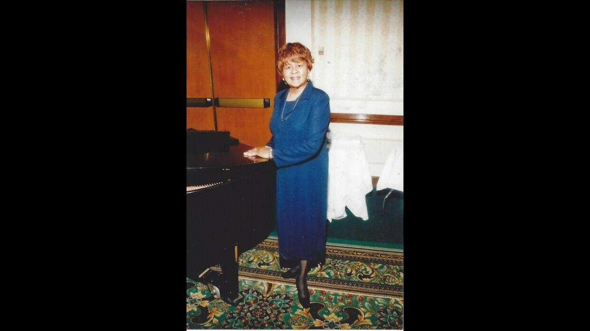 Ella Rowan smiles for a photo. Rowan, who died on Jan. 11 at the age of 89, was the coordinator of the Kansas City, Missouri school district library system, deciding the book catalogue and lessons for kids of all ages.