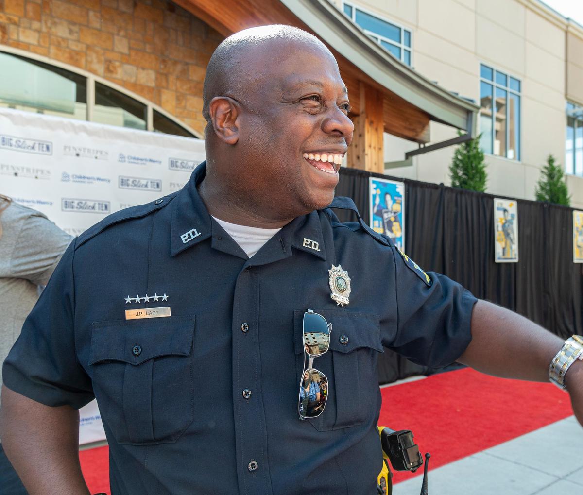 Officer John Lacy, the Overland Park Police Department’s spokesman, helped with security at the Big Slick red carpet Saturday morning outside Pinstripes in Prairiefire.