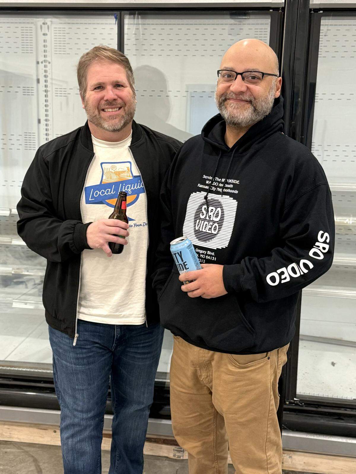 John Couture (left) poses with Local Liquid operations manager Naty Cardenas.