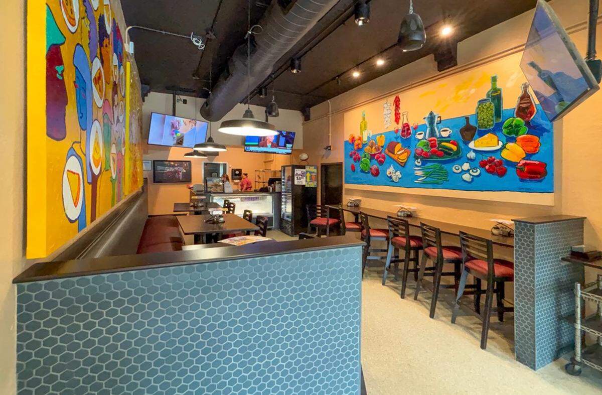 The flagship Minsky’s location now has a dedicated entrance for carryout orders, lined with tables for those who wish to grab a quick slice between errands or on a tight lunch schedule.
