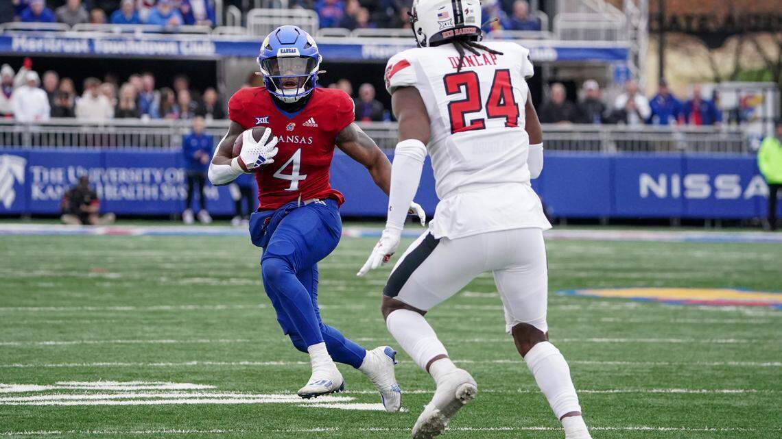 Kansas Jayhawks running back Devin Neal takes off for a 60-yard touchdown against the Texas Tech Red Raiders on Saturday at David Booth Kansas Memorial Stadium.