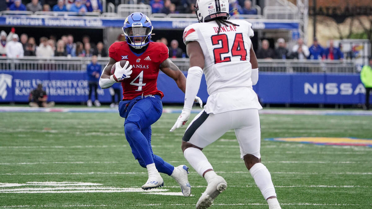 Kansas Jayhawks running back Devin Neal takes off for a 60-yard touchdown against the Texas Tech Red Raiders on Saturday at David Booth Kansas Memorial Stadium.
