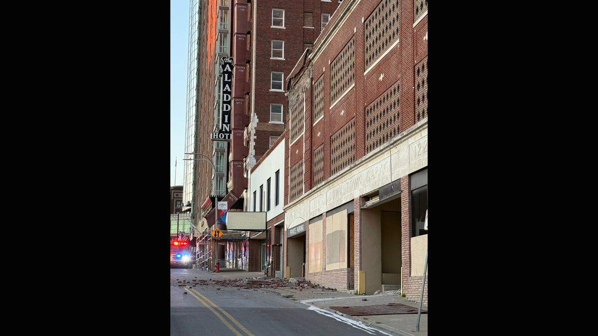 Part of the facade and some of the parapet separated from a downtown Kansas City parking garage Tuesday evening, sending bricks crashing to the sidewalk and street below, said Battalion Chief Riley Nolan with the Kansas City Fire Department. Kansas City police closed Wyandotte Street between 12th and 13th streets overnight.