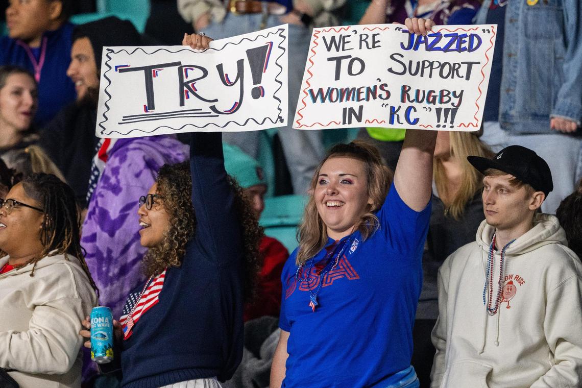 Fans hold signs showing their support for women’s rugby in Kansas City during the USA vs. Canada rugby match at CPKC Stadium on Friday, May 2, 2025. Canada won the match 26-14.