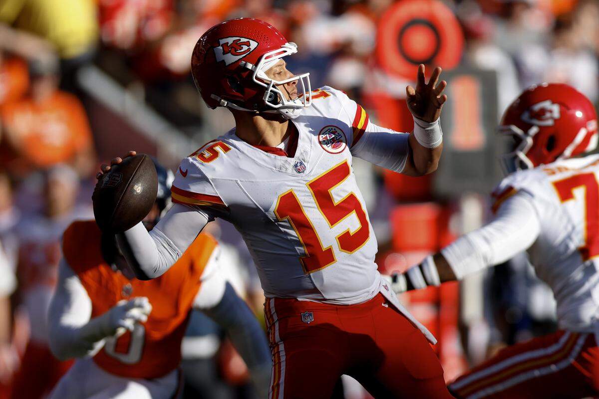 Kansas City Chiefs quarterback Patrick Mahomes passes the ball against the Broncos during an NFL Week 11 game at Empower Field At Mile High in Denver on Sunday, Nov. 16, 2025.