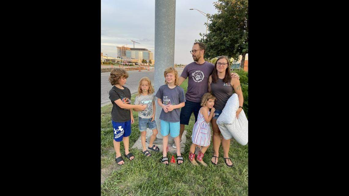 Miranda and Zachary Lawson said they were touched by the number of people attending Saturday’s parade for Fairway police officer Jonah Oswald. “Really puts the job in perspective,” Miranda Lawson said while standing with family.