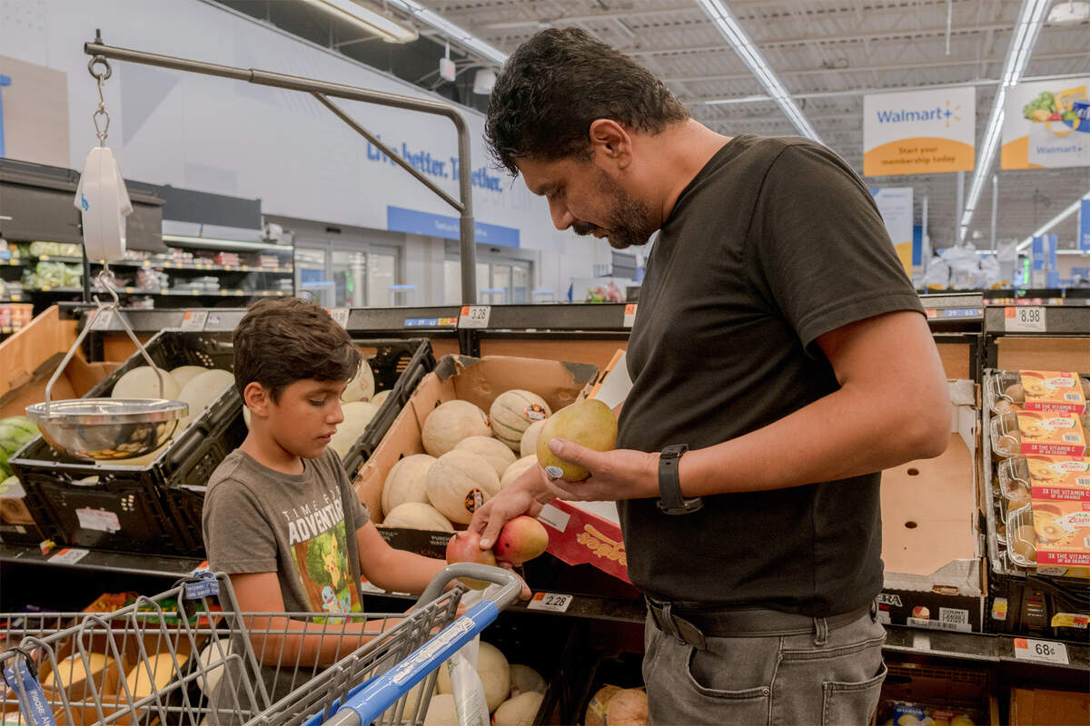 Lemar and a son buy groceries at the local Walmart in Joplin, Missouri.