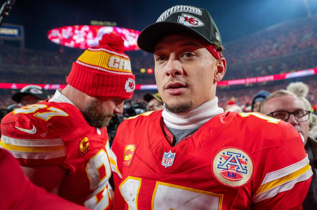 Kansas City Chiefs quarterback Patrick Mahomes (15) waits near the trophy stage after a 32-29 victory over the Buffalo Bills in the AFC Championship Game on Sunday, Jan. 26, 2025, at GEHA Field at Arrowhead Stadium.