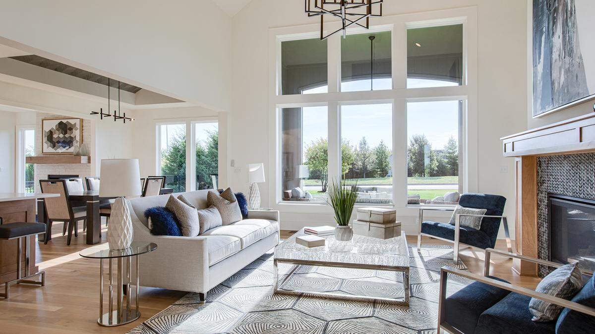 The New Haven in Forest View is a 1.5-story, open-concept living floor plan with a main level flex room, cozy hearth room, and spacious kitchen perfect for gathering.