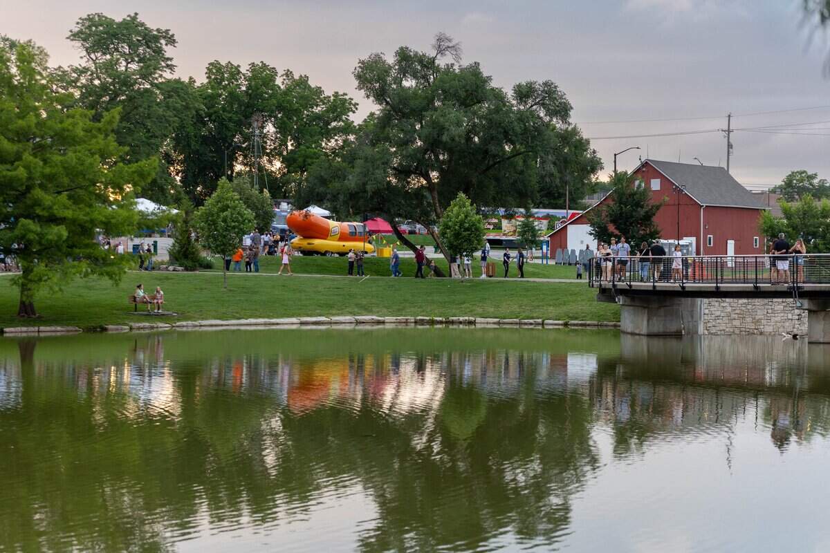 The sun begins to set over the Lenexa Rose's Pond at The Great Lenexa BBQ Battle on Friday, June 26, 2026.