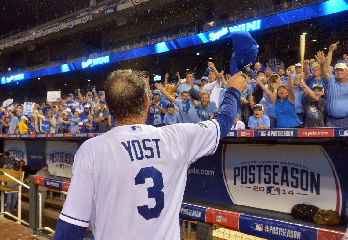 Kansas City Royals manager Ned Yost (3) tips his hat to fans after defeating the Oakland Athletics in the 2014 American League Wild Card playoff baseball game at Kauffman Stadium on Sept. 30, 2014.