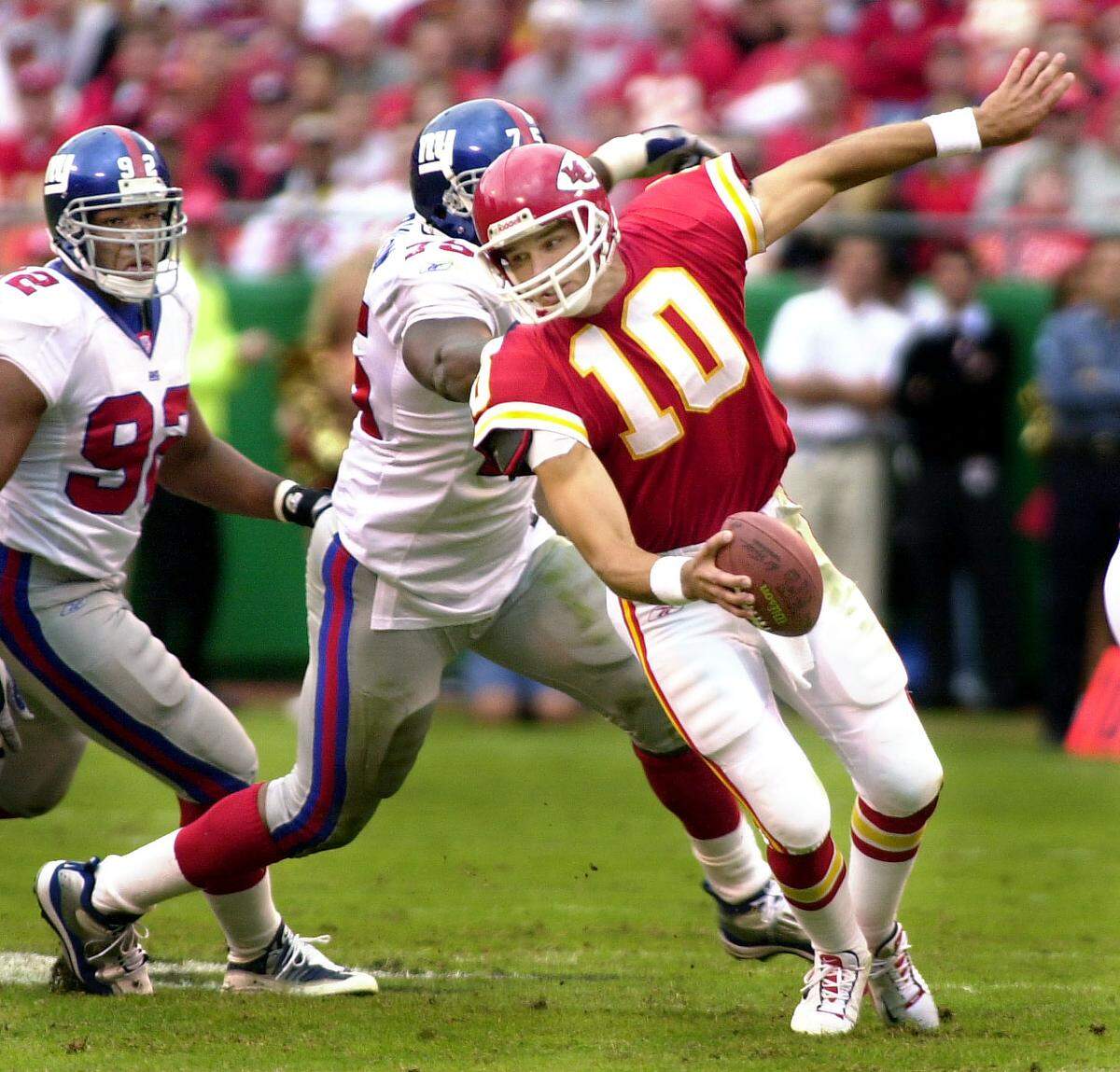 Chiefs quarterback Trent Green couldn’t avoid this sack by the New York Giants’ Keith Hamilton during a post-9/11 game on Sept. 23, 2001 at Arrowhead Stadium.