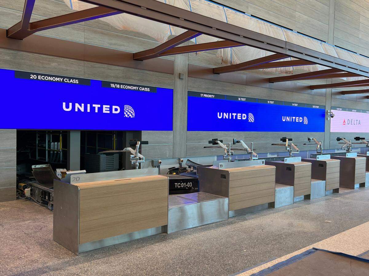A digital wall behind the ticketing counters uses LED technology for airline branding. That gives the terminal flexibility so that if an airline only needs counter space in the morning, that space can be assigned to another airline in the afternoon. It also makes it easier to allow the branding reflect the airlines as they expand at the airport.