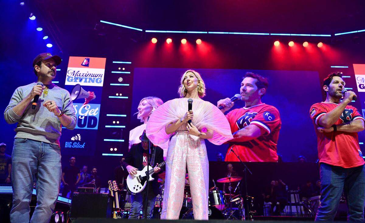 Co-hosts Jason Sudeikis, left, Heidi Gardner and Paul Rudd perform on stage Saturday, May 31, 2025, during the Big Slick Party and Show at T-Mobile Center in Kansas City.